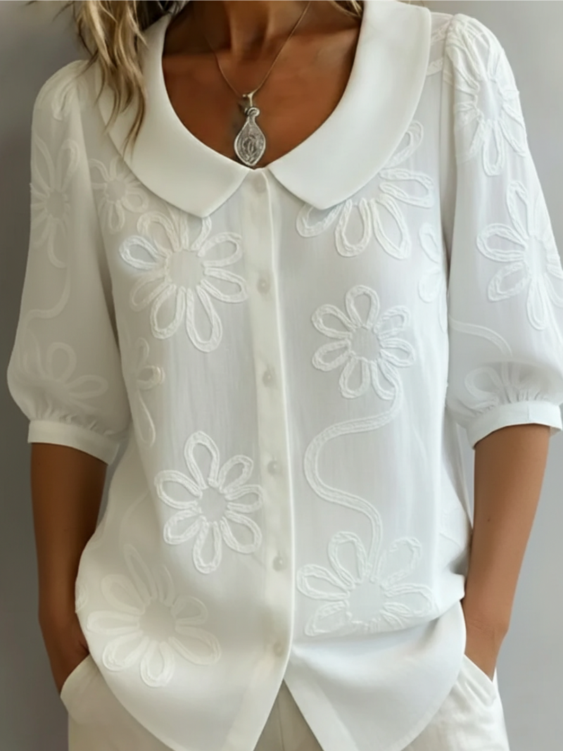 Elegant Short-Sleeved Shirt with Floral Decor