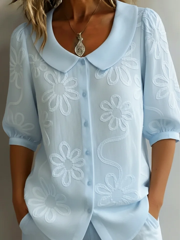 Elegant Short-Sleeved Shirt with Floral Decor