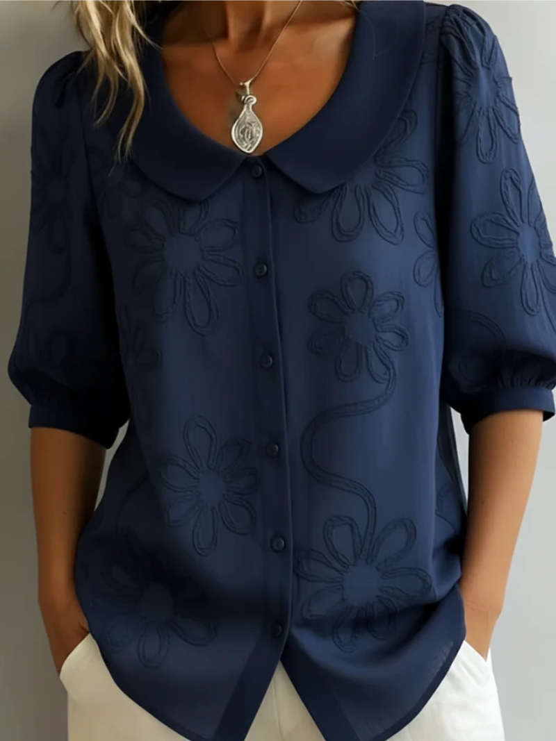 Elegant Short-Sleeved Shirt with Floral Decor